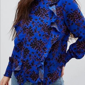 Only a Floral High Neck Blouse With Ruffles